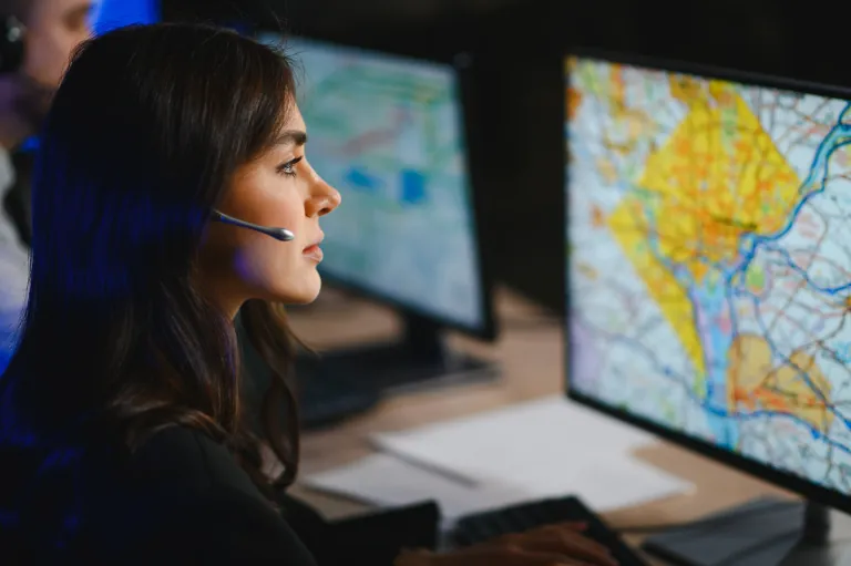 An Aureaux logistics specialist tracking routes in the control room
